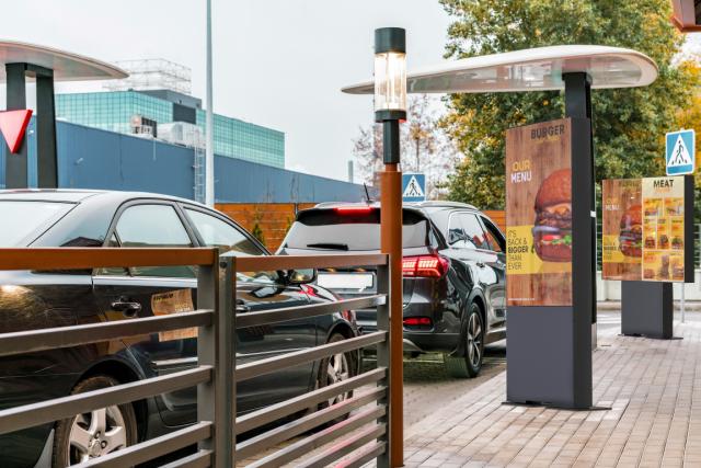 Outdoor enclosures at a drive-through